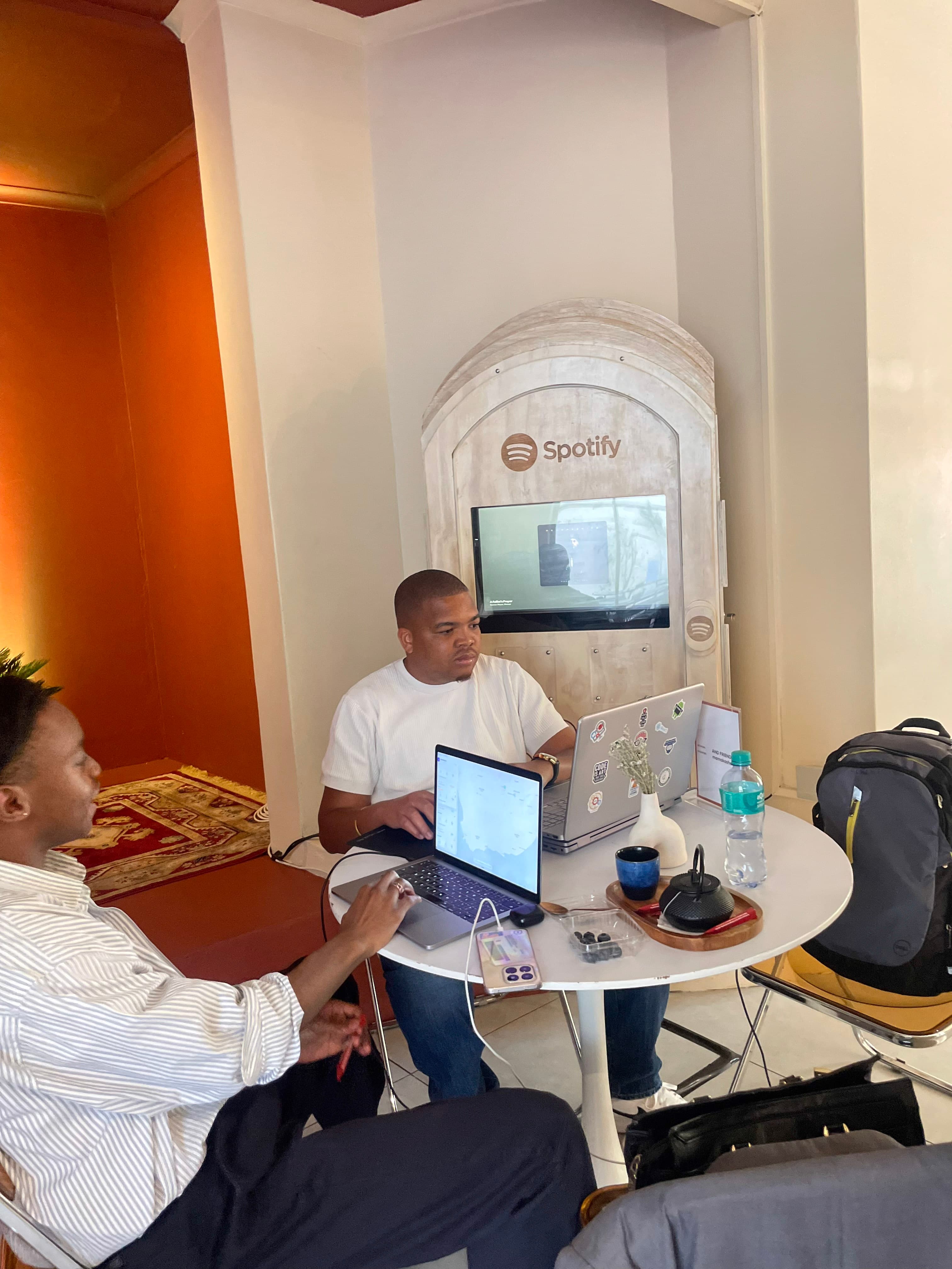 Two attendees pair-programming together at the Johannesburg meetup